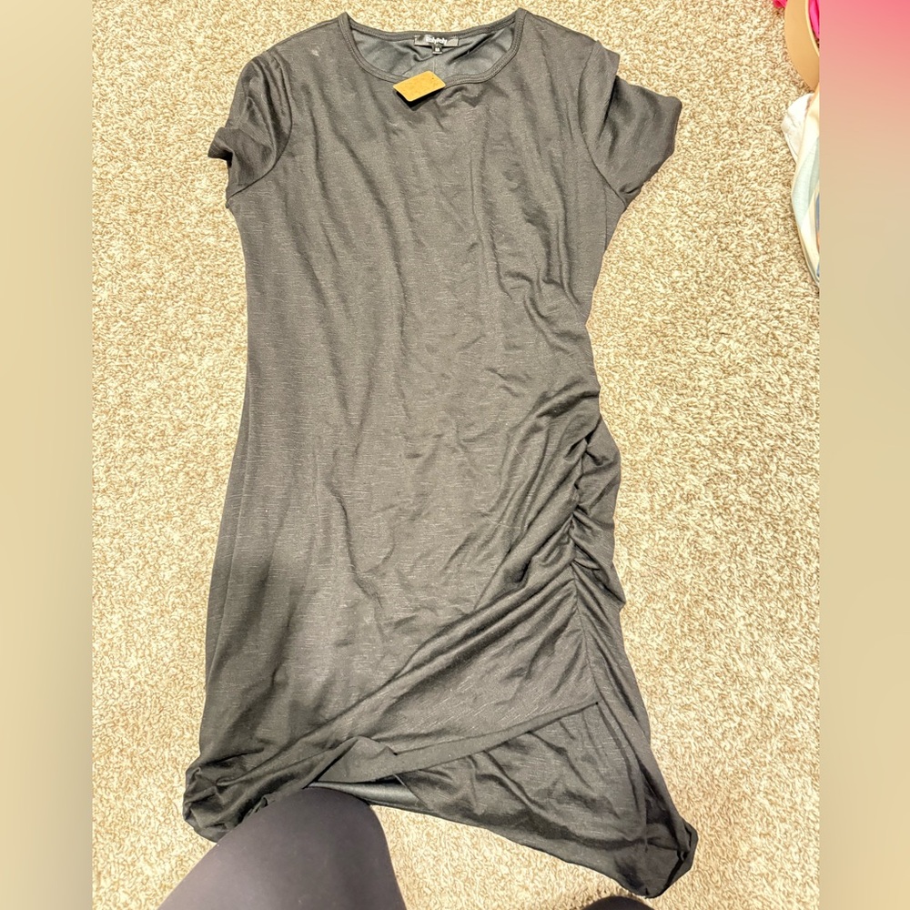 RolyPoly. Medium. Cinced on the side. NWT. Black.